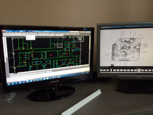 Dual CAD monitor setup for efficiency.